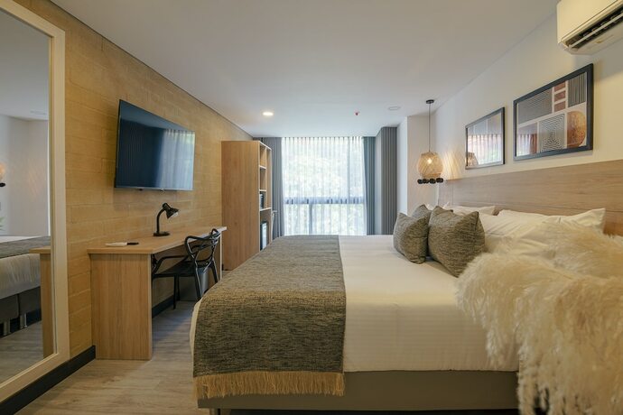 Imagen de la habitación del Hotel First Class. Foto 16