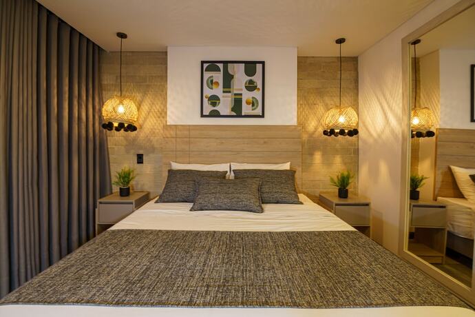 Imagen de la habitación del Hotel First Class. Foto 18