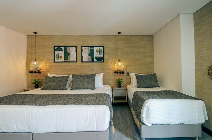 Imagen de la habitación del Hotel First Class. Foto 21