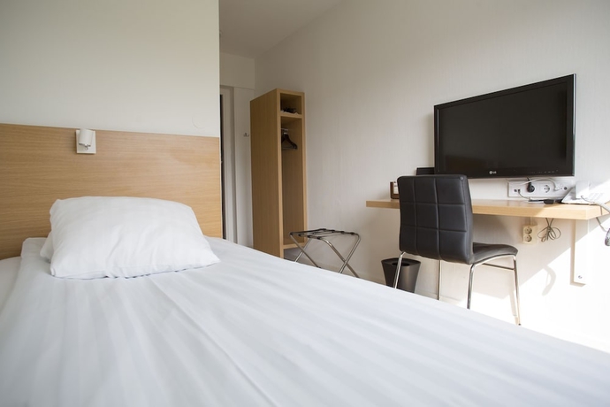 Imagen de la habitación del Hotel First Dragonen. Foto 16