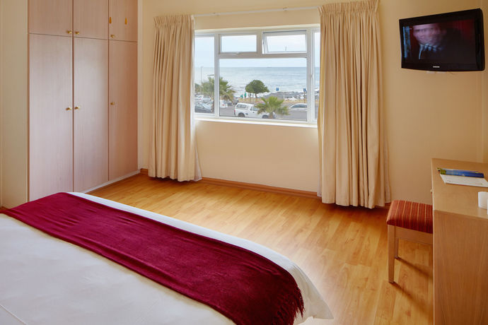 Imagen de la habitación del Hotel First Group Riviera Suites. Foto 4