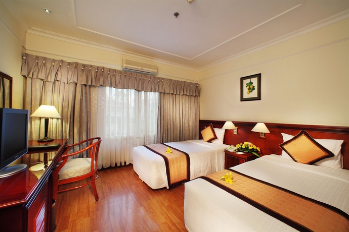 Imagen de la habitación del Hotel First, Ho Chi Minh. Foto 3