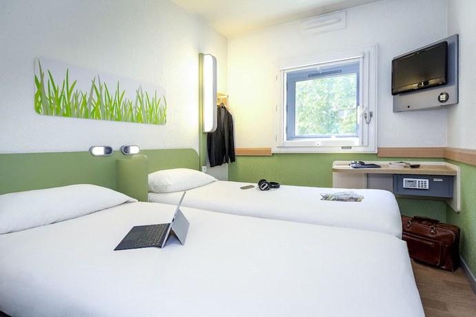 Imagen de la habitación del Hotel First Inn. Foto 2
