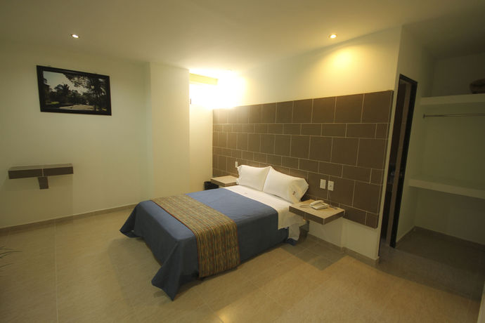 Imagen de la habitación del Hotel First Inn. Foto 11