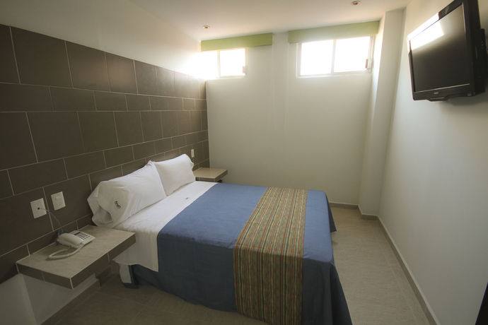 Imagen de la habitación del Hotel First Inn. Foto 12