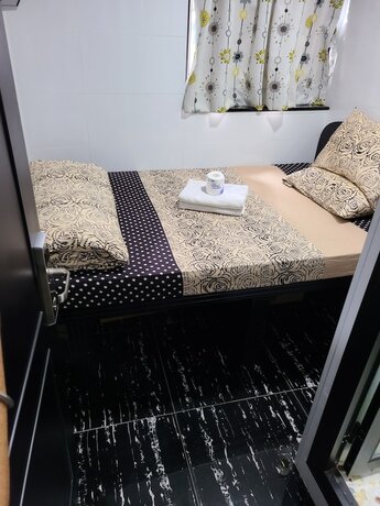 Imagen de la habitación del Hotel First Inn, Kowloon. Foto 12