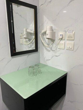Imagen de la habitación del Hotel First Inn, Kowloon. Foto 13