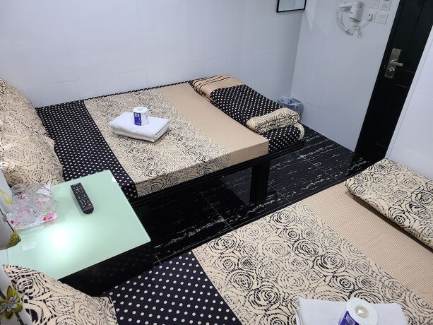 Imagen de la habitación del Hotel First Inn, Kowloon. Foto 16