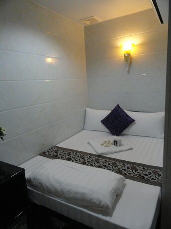 Imagen de la habitación del Hotel First Inn, Kowloon. Foto 17