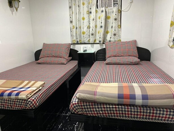 Imagen de la habitación del Hotel First Inn, Kowloon. Foto 18