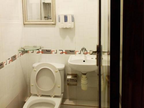 Imagen de la habitación del Hotel First Inn, Kowloon. Foto 8