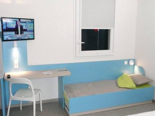 Imagen de la habitación del Hotel First Inn Les Ulis. Foto 9