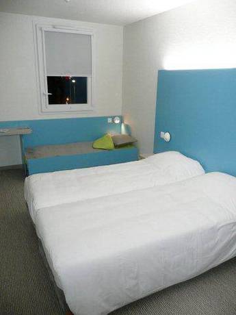 Imagen de la habitación del Hotel First Inn Les Ulis. Foto 15