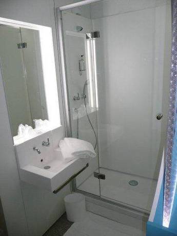 Imagen de la habitación del Hotel First Inn Les Ulis. Foto 16