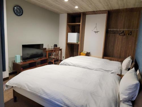 Imagen de la habitación del Hotel First Inn Takamatsu. Foto 14