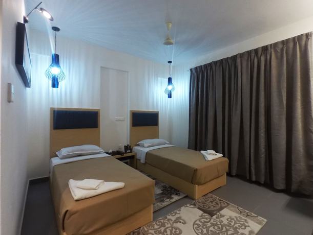 Imagen de la habitación del Hotel First Inns. Foto 9