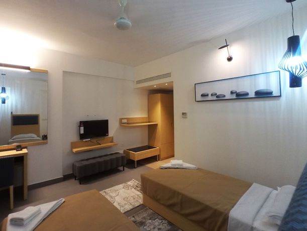 Imagen de la habitación del Hotel First Inns. Foto 15