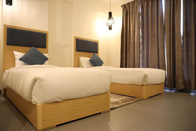 Imagen de la habitación del Hotel First Inns. Foto 16