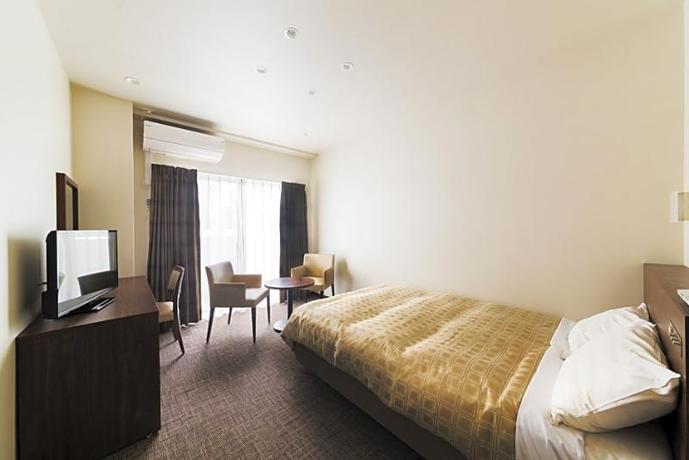 Imagen general del Hotel First, Izumisano. Foto 17