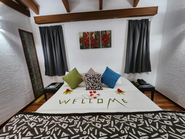Imagen de la habitación del Hotel First Landing Beach Resort and Villas. Foto 2