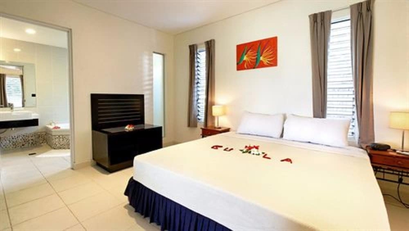 Imagen de la habitación del Hotel First Landing Beach Resort and Villas. Foto 6