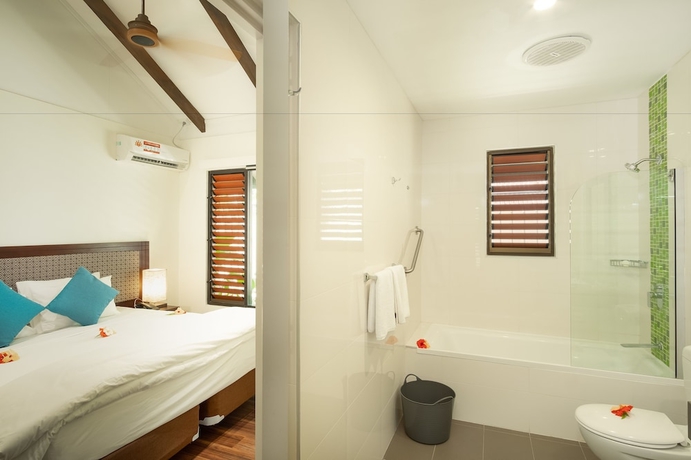 Imagen de la habitación del Hotel First Landing Beach Resort and Villas. Foto 8