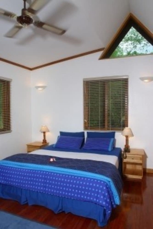 Imagen de la habitación del Hotel First Landing Beach Resort and Villas. Foto 10