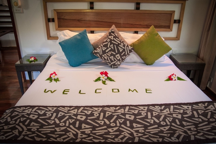 Imagen de la habitación del Hotel First Landing Beach Resort and Villas. Foto 11