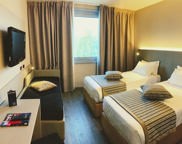 Imagen de la habitación del Hotel First Malpensa. Foto 6