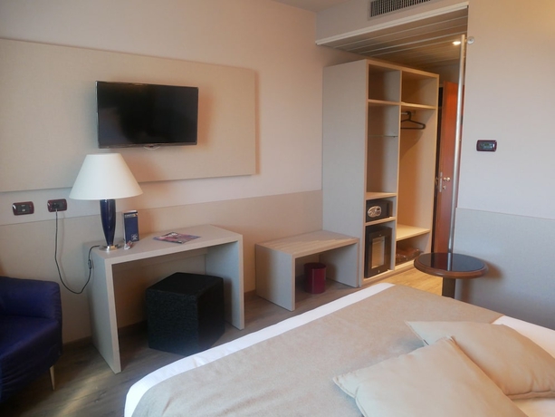 Imagen de la habitación del Hotel First Malpensa. Foto 7