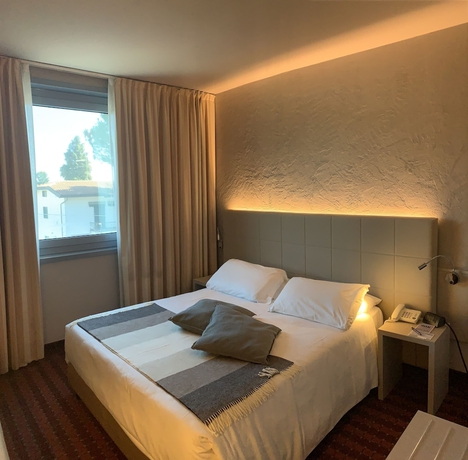 Imagen de la habitación del Hotel First Malpensa. Foto 8