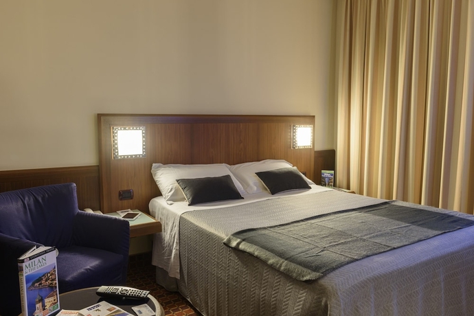 Imagen de la habitación del Hotel First Malpensa. Foto 9