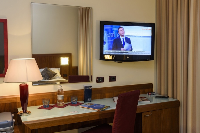 Imagen de la habitación del Hotel First Malpensa. Foto 11