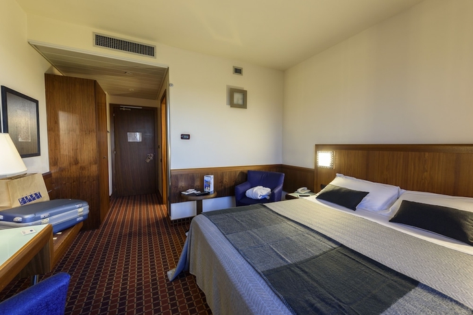 Imagen de la habitación del Hotel First Malpensa. Foto 16