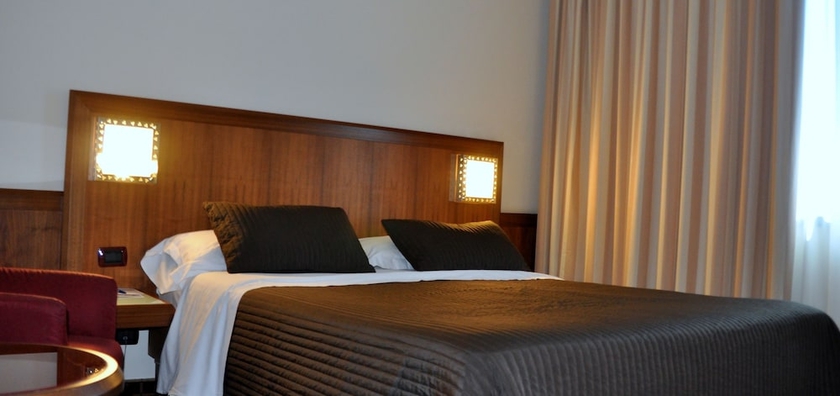 Imagen de la habitación del Hotel First Malpensa. Foto 17