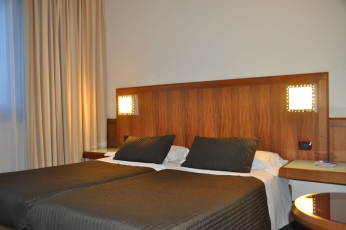 Imagen de la habitación del Hotel First Malpensa. Foto 18