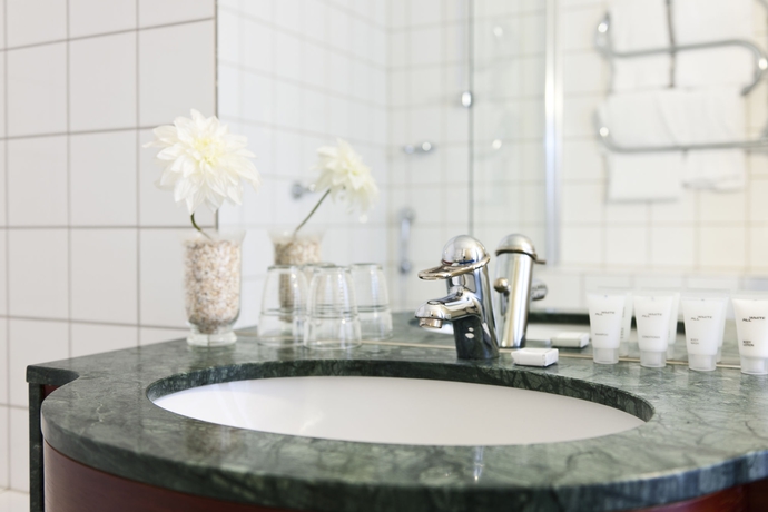 Imagen de la habitación del Hotel First Millennium. Foto 9