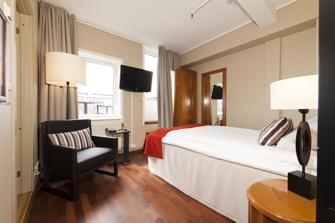 Imagen de la habitación del Hotel First Millennium. Foto 11