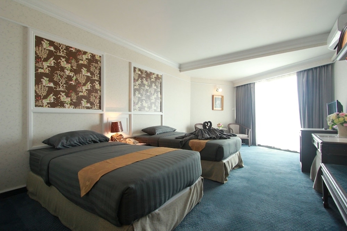 Imagen de la habitación del Hotel First Pacific Cirrus. Foto 12