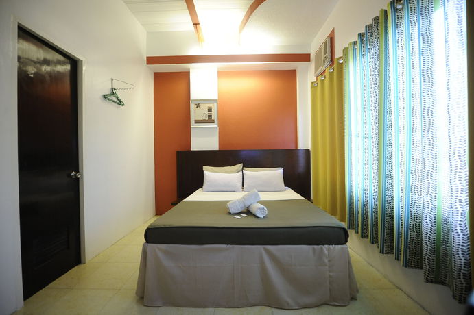 Imagen de la habitación del Hotel First Pacific Inn. Foto 8