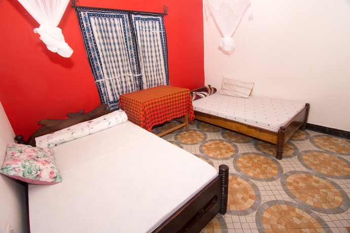 Imagen de la habitación del Hotel First Point Arusha Hostel. Foto 7