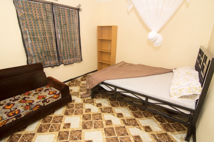 Imagen de la habitación del Hotel First Point Arusha Hostel. Foto 10