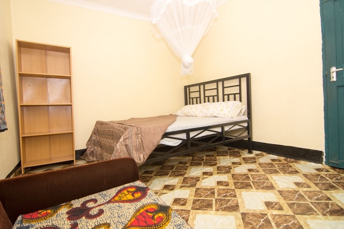 Imagen de la habitación del Hotel First Point Arusha Hostel. Foto 11