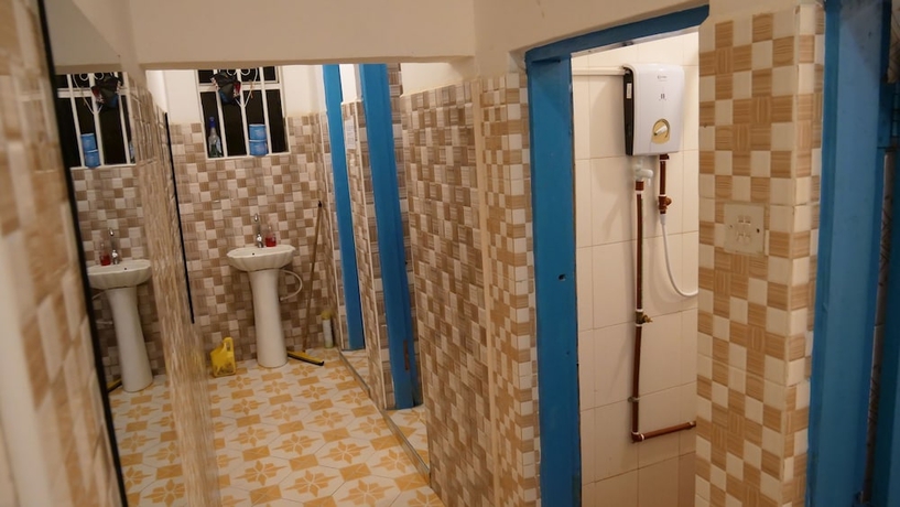 Imagen de la habitación del Hotel First Point Arusha Hostel. Foto 15