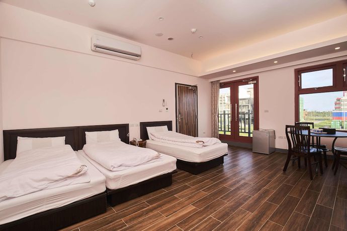 Imagen de la habitación del Hotel First Shanhai. Foto 4