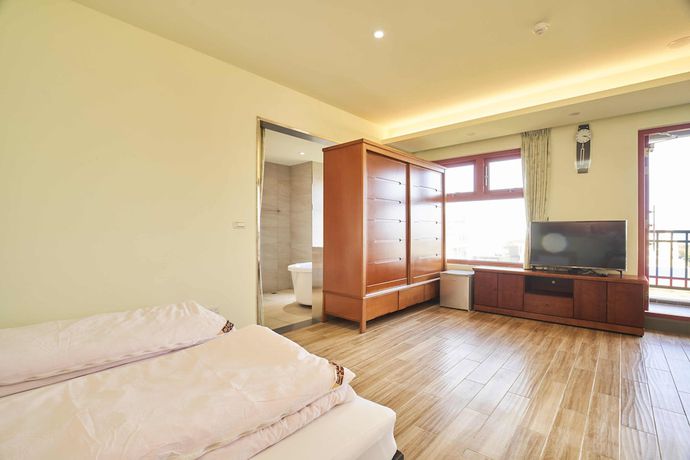 Imagen de la habitación del Hotel First Shanhai. Foto 5