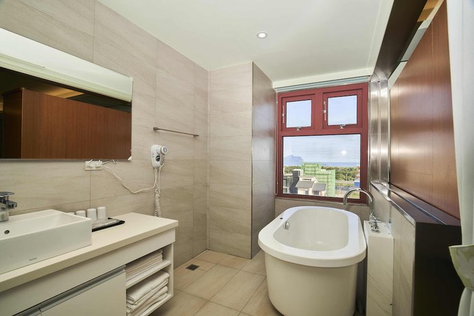 Imagen de la habitación del Hotel First Shanhai. Foto 6