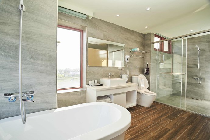 Imagen de la habitación del Hotel First Shanhai. Foto 8