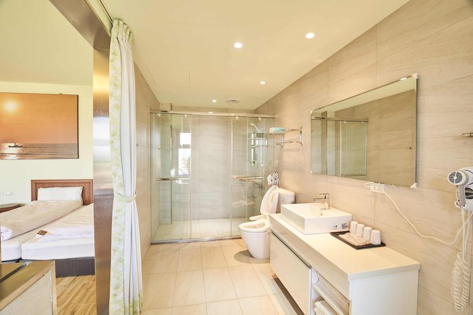 Imagen de la habitación del Hotel First Shanhai. Foto 10