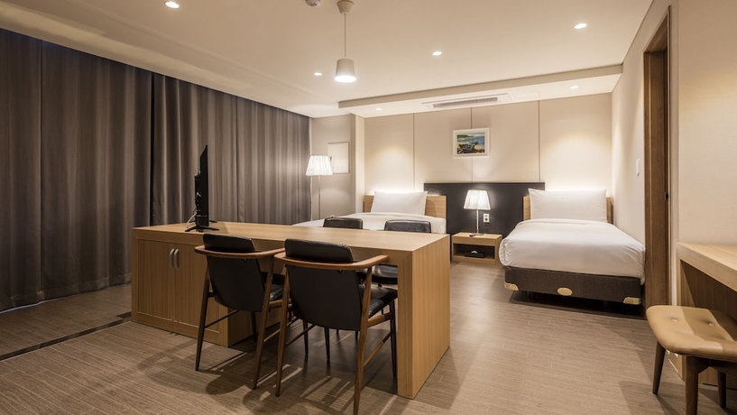 Imagen de la habitación del Hotel First Stay. Foto 13